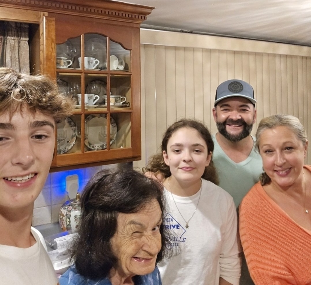 Jay and his family at home